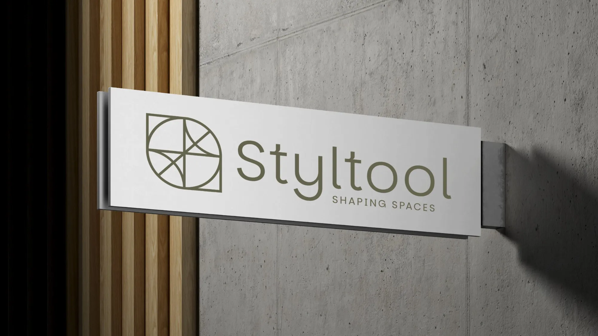 White Styltool sign with the olive horizontal lockup, mounted on a concrete wall beside timber slats